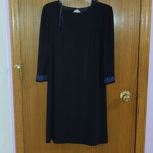 Elegant Black Dress with Embellished Sleeves